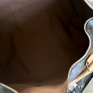 Louis Vuitton authentic travel bag ….